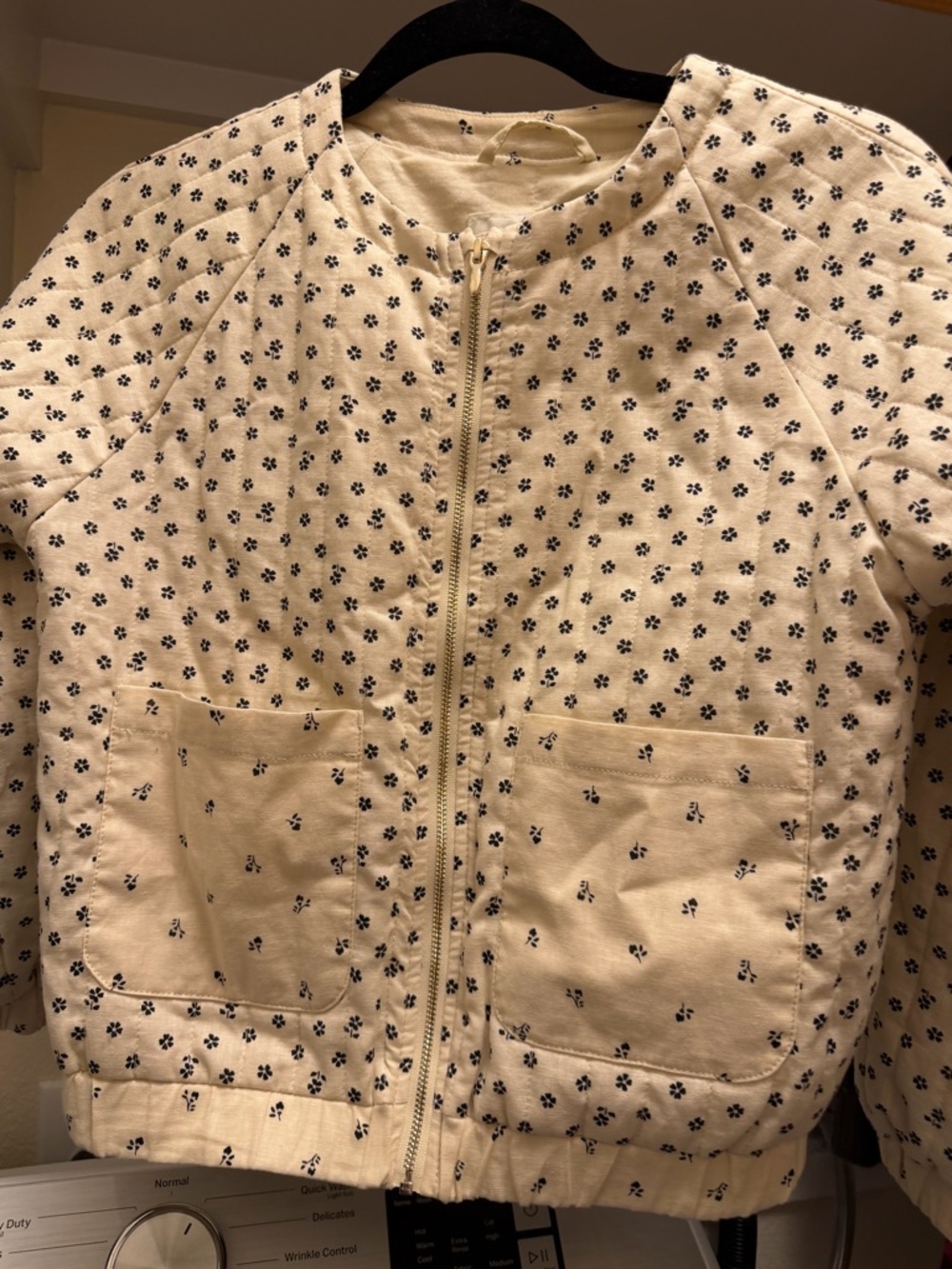 H&M lightly quilted Cream Jacket with black Floral Print
